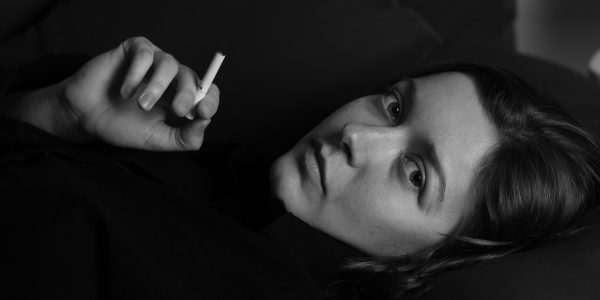 Woman, cigarette, smoking — Dr. Sudipta Mohanty Holistic Lifestyle Solutions for Migraine Management