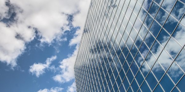 Building, reflection, clouds — Nangs Melbourne Services Providing Convenient Balloon Gas Delivery for Events and Gatherings