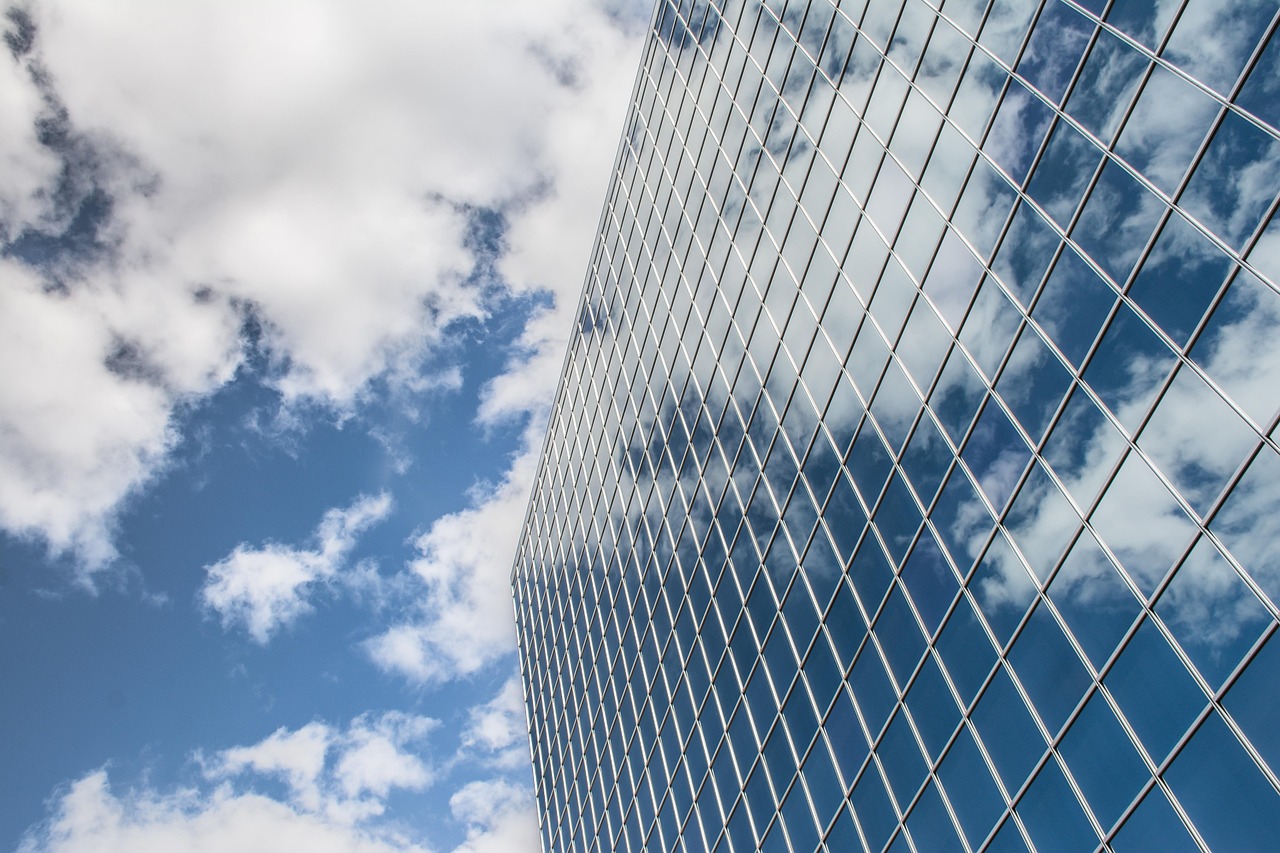Building, reflection, clouds — Nangs Melbourne Services Providing Convenient Balloon Gas Delivery for Events and Gatherings